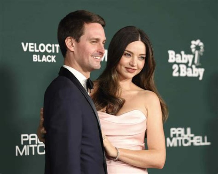 Miranda Kerr & Orlando Bloom, loved up at the Global Green party: suspicious?