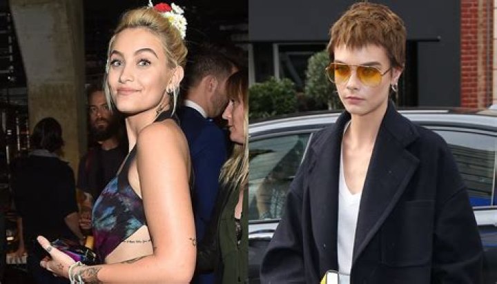 Paris Jackson & Cara Delevingne were making out, but they’re not ‘dating’